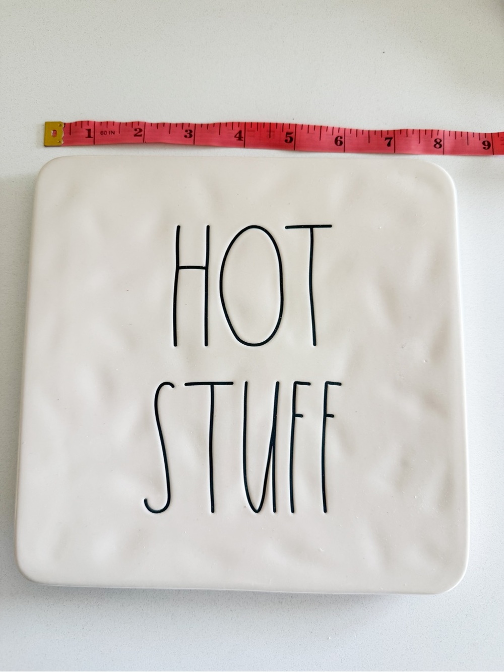 Rae Dunn White Ceramic 'HOT STUFF' Trivet/Serve Plate with Black Lettering - Picture 2 of 3